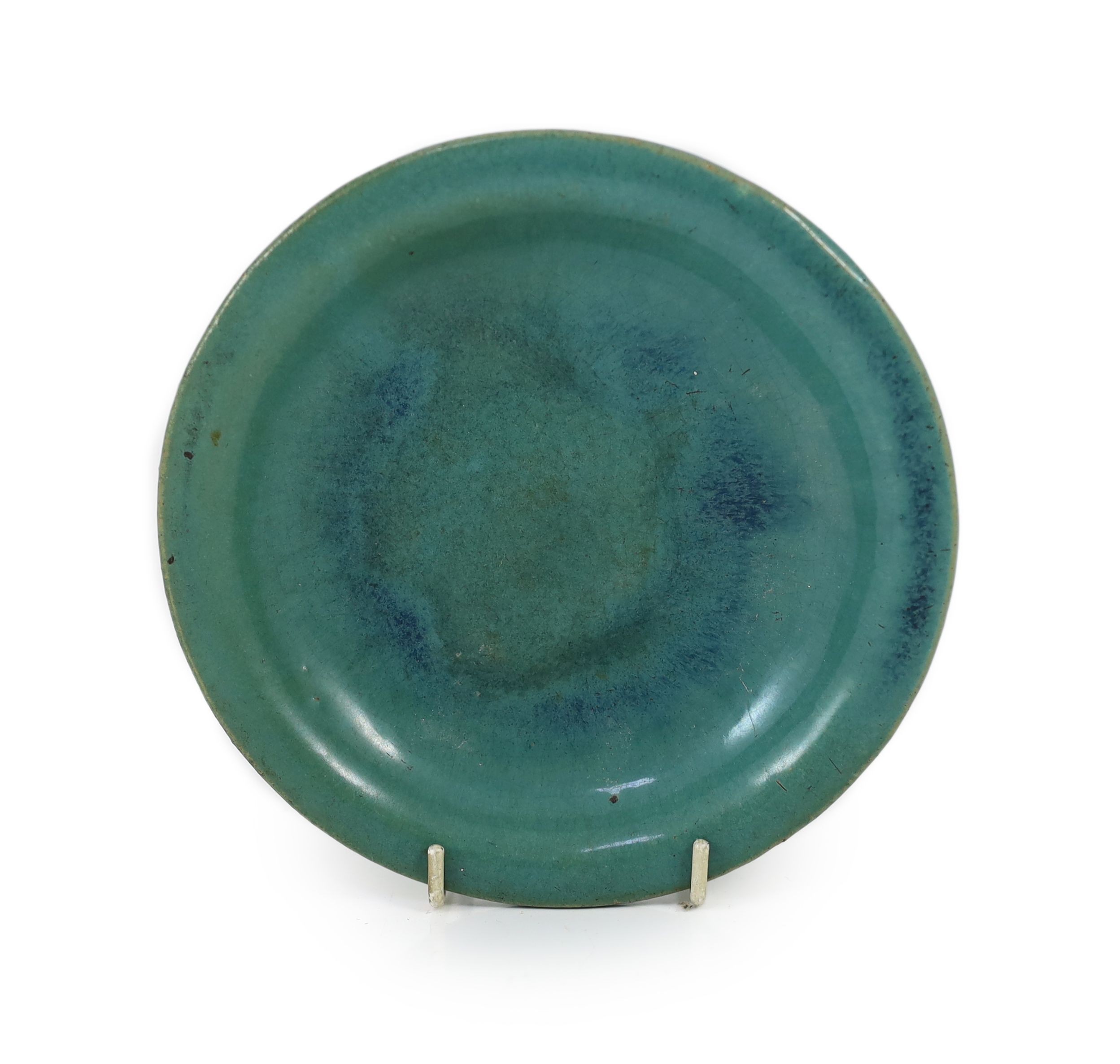 A Chinese Jun style green and blue glazed dish, Shiwan kilns, 18th/19th century, 17cm diameter